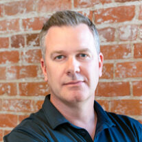 headshot profile photo of John Garcia