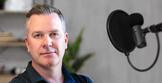 John Garcia recording a podcast