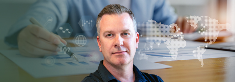 John Garcia with Forbes Finance Council article on laptop